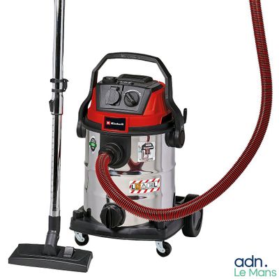 une image représentant un aspirateur muni d'un tuyau rouge