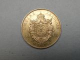 an image of a gold coin with a coat of arms on it