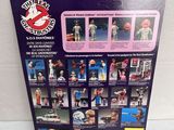 the back of a box with the contents of the ghostbuss action figures