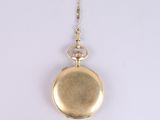 an image of a gold pocket watch with a chain on a white background