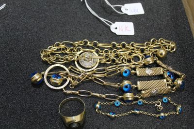 a lot of jewelry that is on display on the table