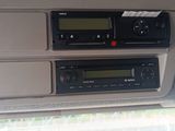 a picture of a car dashboard with a radio in it