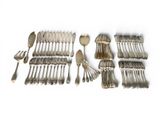 a lot of silver spoons and forks on the table