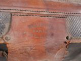 a close up of a piece of luggage with a label on it