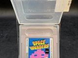 a plastic box with a game in it on a table