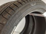 a close up of a tire on display in a showroom