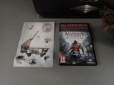 assassin ' s creed and assassin ' s creed on a table next to a video game
