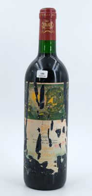 a bottle of wine that is sitting on a table