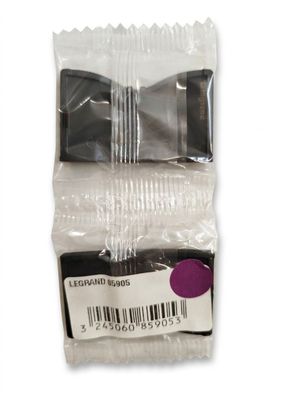a plastic bag with a black bow on top of it