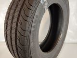 a close up of a tire on a white surface