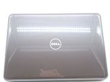 dell laptop computer sitting on top of a table with a white background