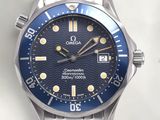 a close up of a watch with a blue face