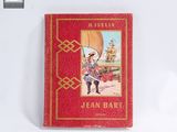 un livre rouge sur lequel figure l'image d'un pirate