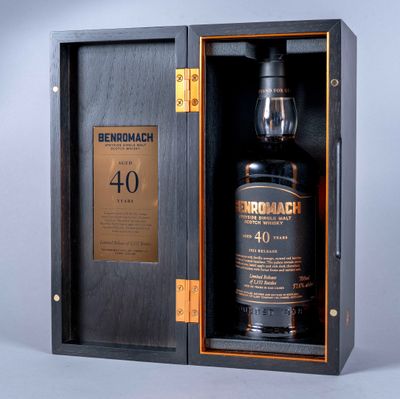 an image of a bottle of whisky in a wooden case