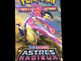 a close up of a bag of pokemon cards on a black background