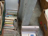 many boxes of books and other items on the floor