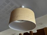 a lamp that is hanging from the ceiling in a room
