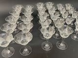 a lot of empty wine glasses on the table