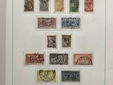 an open book with a bunch of stamps on it