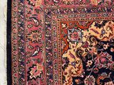 a close up of a rug on a floor with a white background