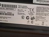 a label on the back of a printer that says hp