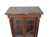a small cabinet with a marble top on a white background