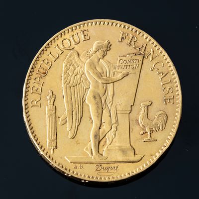 an image of a gold coin with an angel on it
