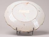 an image of a white plate with a label on it