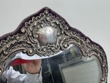 a person taking a picture of themselves in a mirror