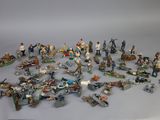 a lot of figurines that are sitting on a table