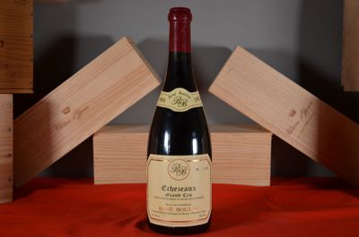 a bottle of wine that is sitting on a table