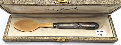 a wooden spoon and a wooden spoon in a box