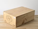 a wooden box that is sitting on a wooden table