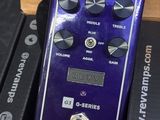 the purple pedalbox is sitting on top of a cardboard box