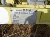 a close up of a sign on the side of a yellow truck