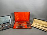 three different types of silverware in a case