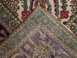 an image of a close up of a rug with many different colors