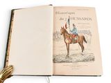 an open book with a picture of a man on a horse