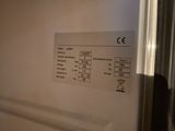 an image of a white refrigerator with the door open