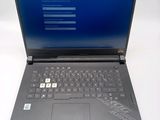 a laptop with a blue screen sitting on a table