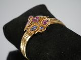 an image of a close up of a ring on a napkin