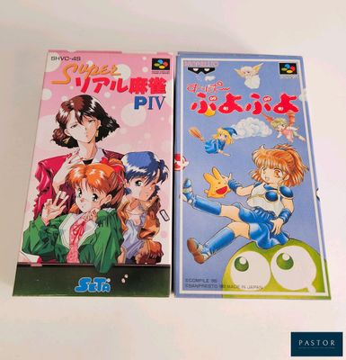 deux livres sur l'anime posés sur une table blanche