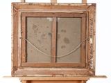 an old wooden easel with a painting on top of it on a white background