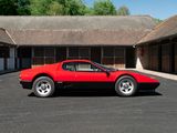 a red sports car parked in front of a building