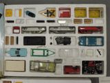 a lot of toy cars that are sitting on a table