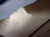 a piece of paper that has been torn off of it