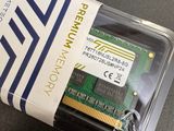 a memory card in a plastic container on a table