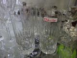 a lot of wine glasses on the table