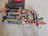 a lot of tools that are laying out on the floor