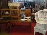 a room filled with antique furniture and antiques on display